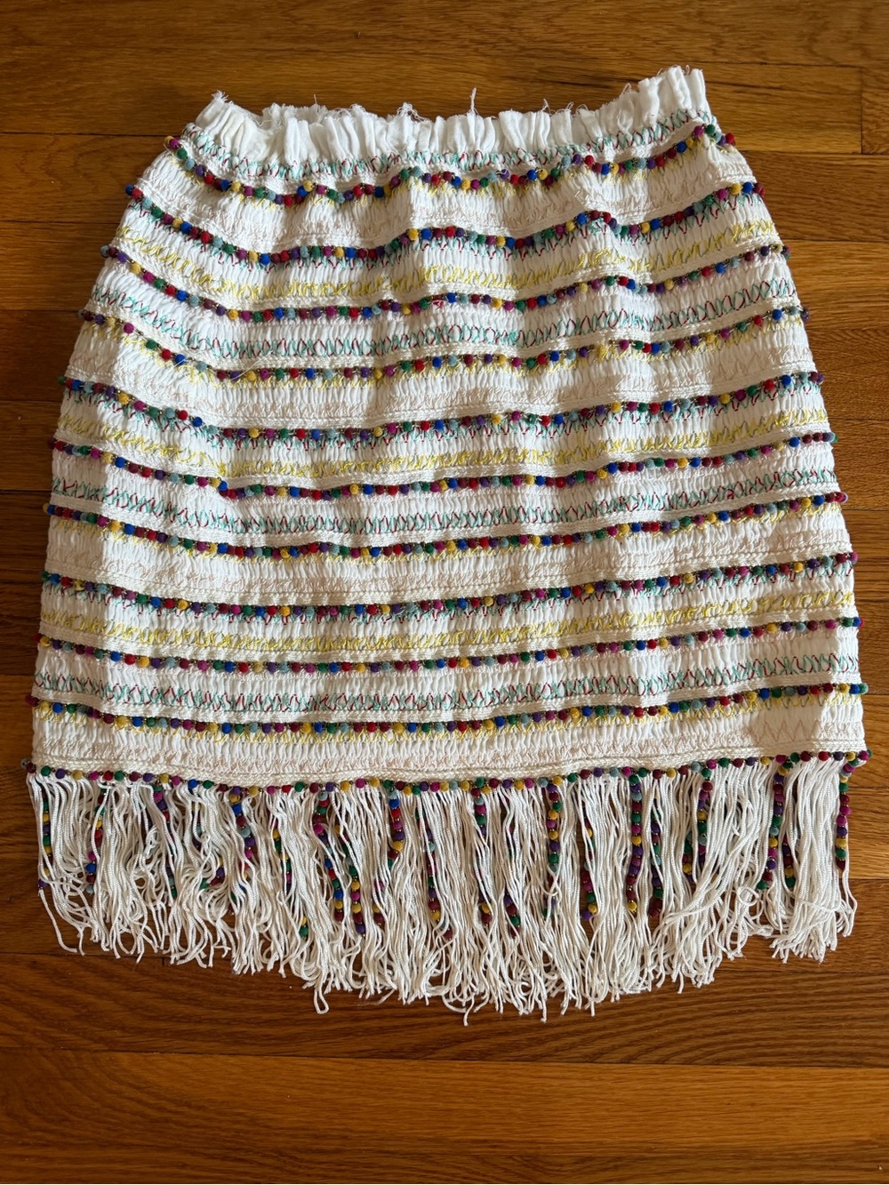 MAJORELLE White Knit Mini Skirt with Multicolor Pom-Pom Stripes